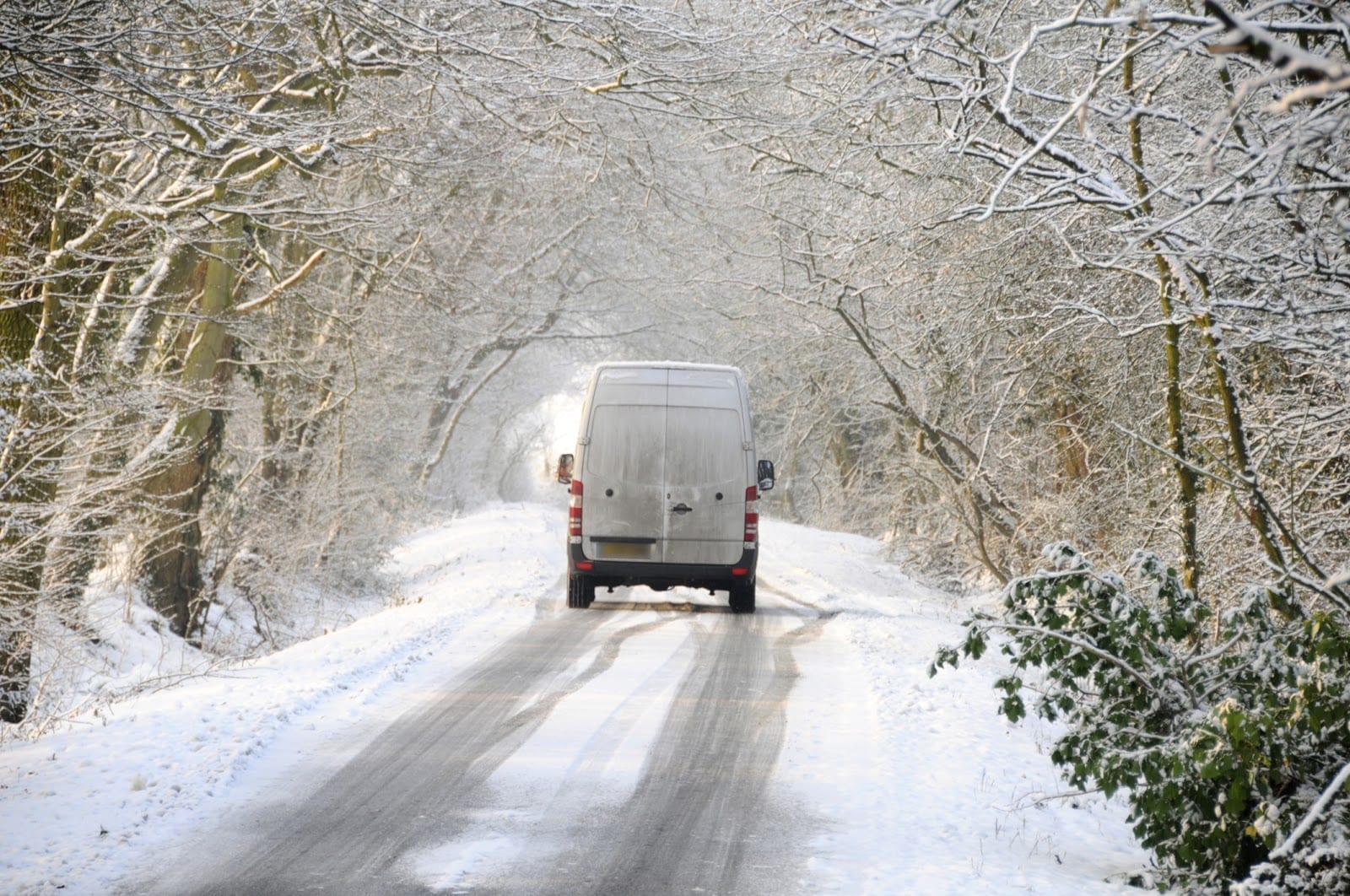 A van driving in hazardous conditions